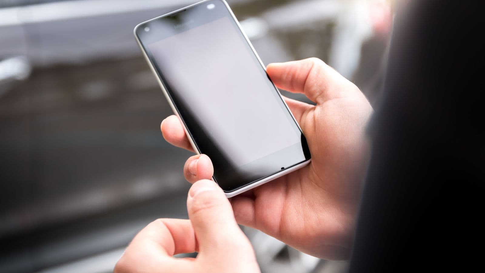 A person checking their smartphone